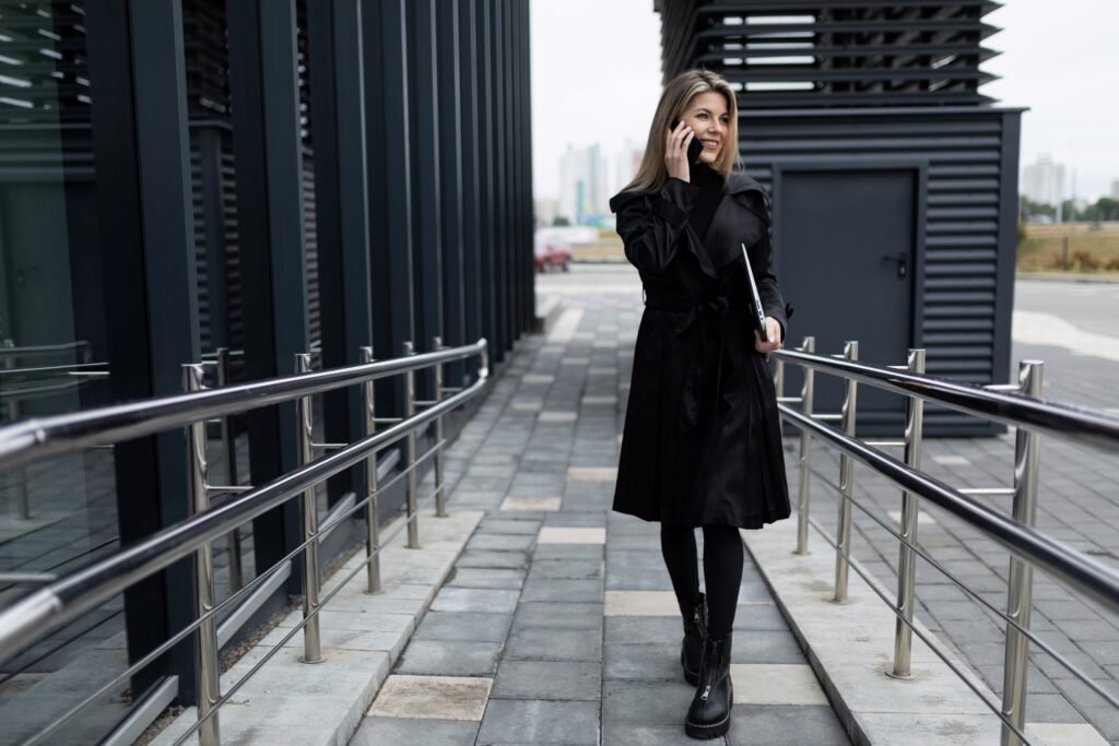 a middle aged business woman walks into an office utc