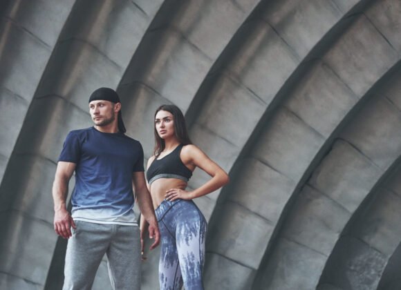 a sports couple resting after a workout is a sexy utc