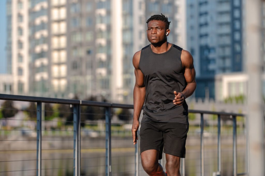 confident african man in sportswear looking concen utc
