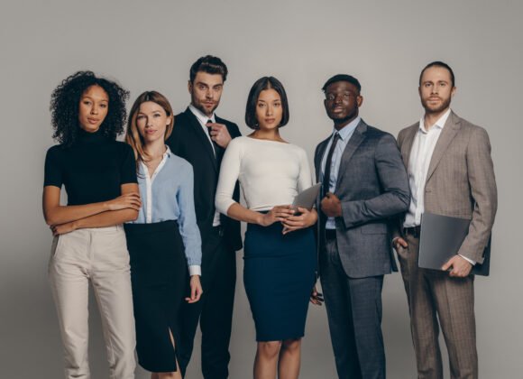 confident young business people looking at camera utc