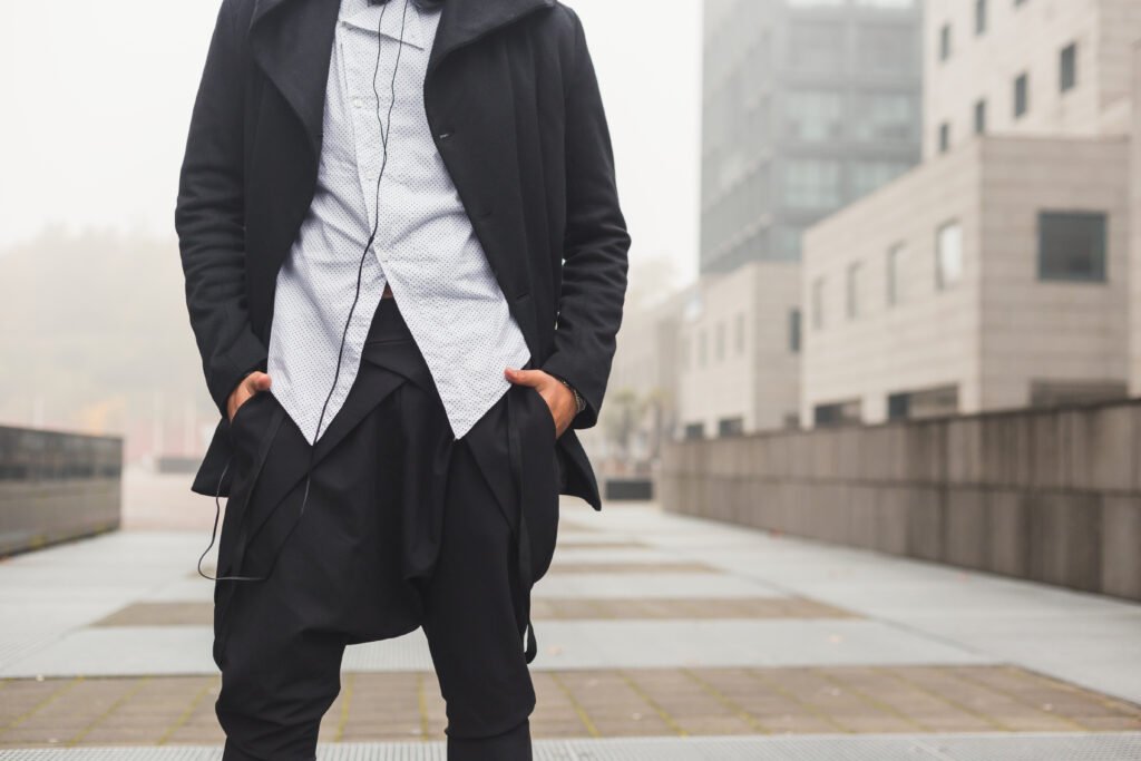 detail of a young handsome indian man posing in an utc