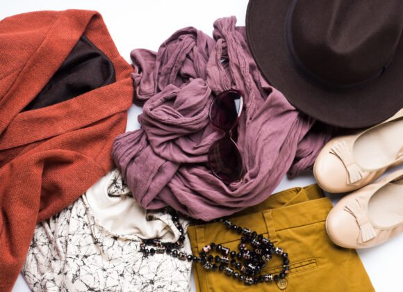 flat lay with woman s autumn clothes glasses hat utc