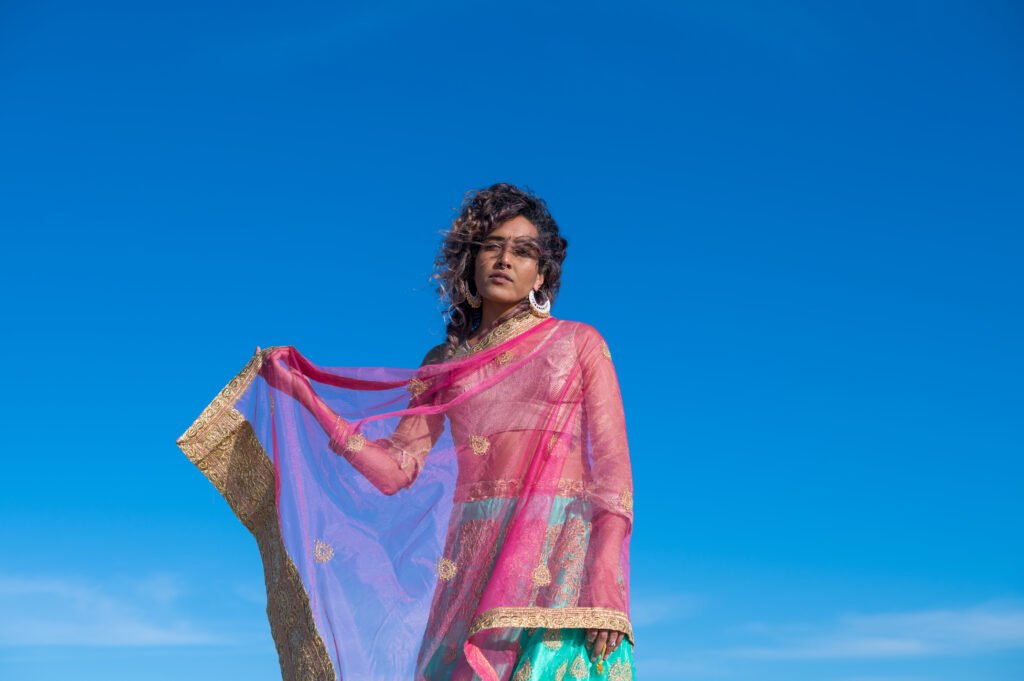 portrait of beautiful woman in colorful wear utc