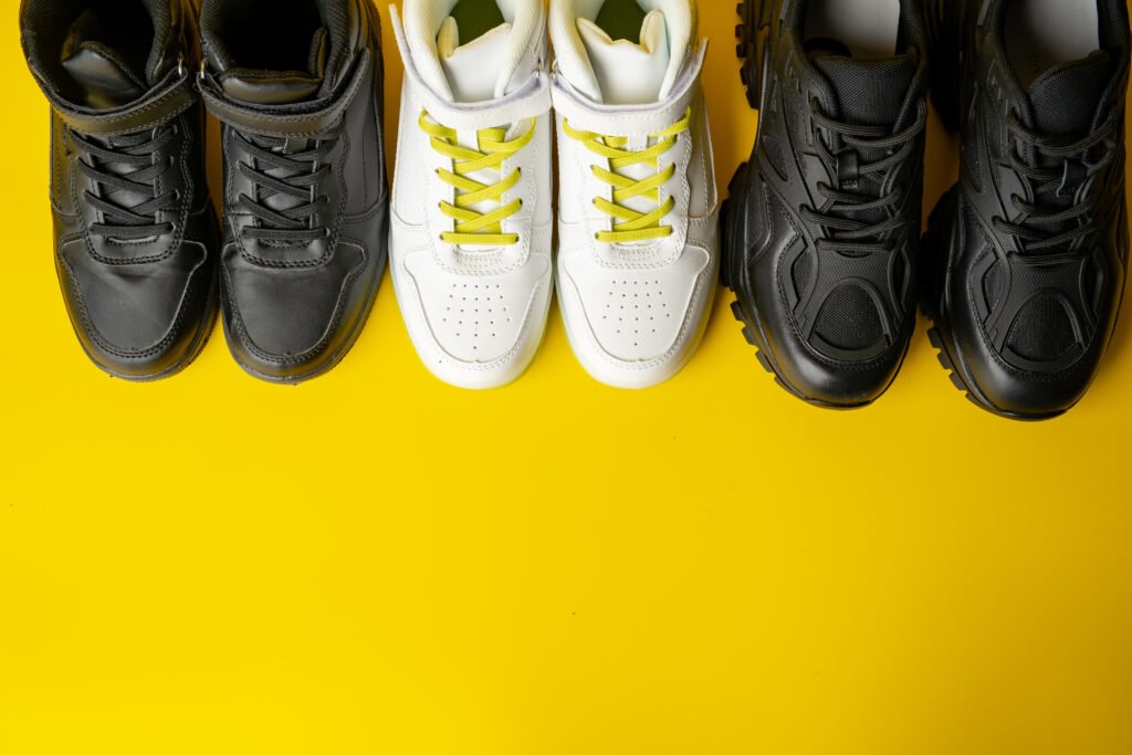 several pairs of fashion trendy sport shoes on yel utc