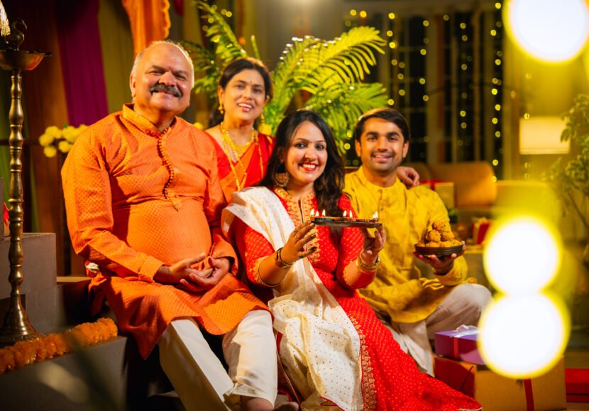 smiling indian family greets on diwali while sitti utc
