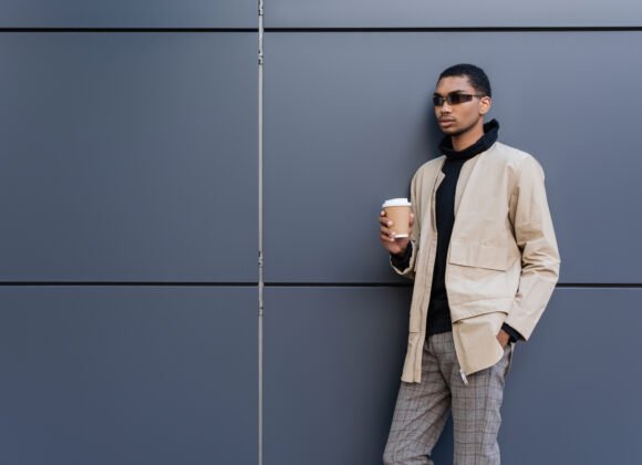 stylish african american man in sunglasses and aut utc