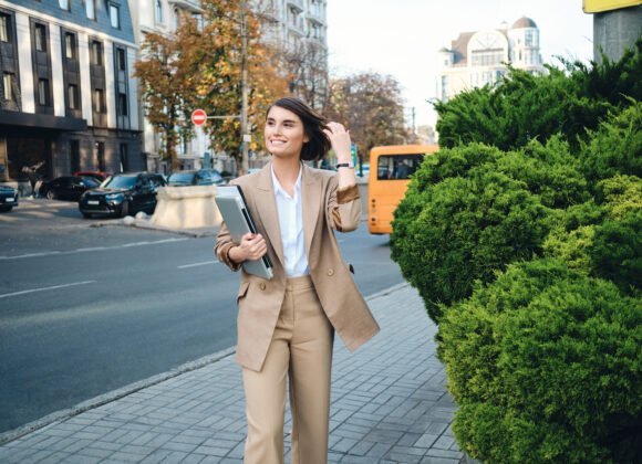 young attractive positive businesswoman in beige s 2026 03 10 04 02 18 utc scaled