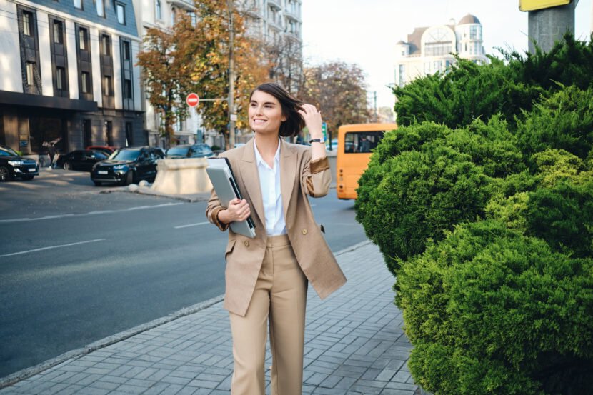 young attractive positive businesswoman in beige s 2026 03 10 04 02 18 utc scaled