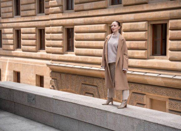 young beautiful woman wearing coat walking in the 2026 01 08 07 46 22 utc scaled