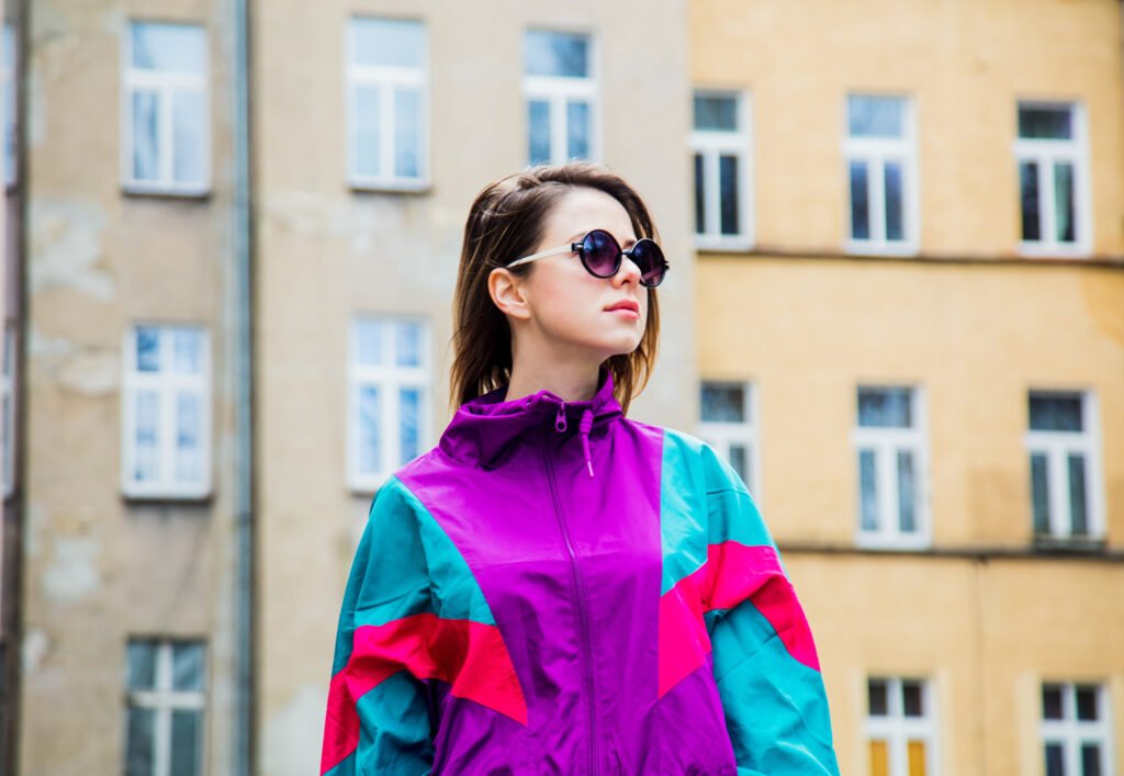 young woman in jacket of s style stay at back y utc